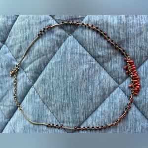 Cabi La Boeheim necklace with red and gold accents.